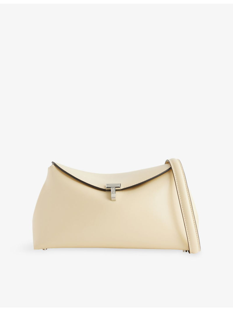 Totême Mini T-Lock leather clutch bag, imported from the UK