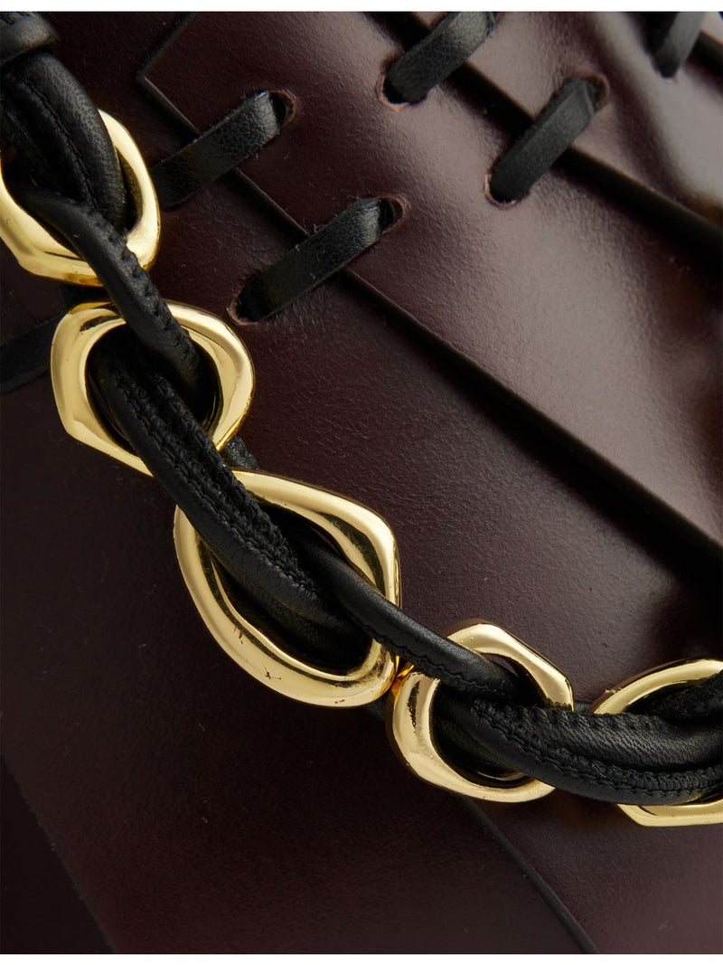 AMANU panelled leather mini top-handle bag, imported from the UK