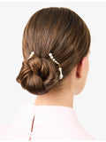 Beatriz Palacios gold-plated freshwater pearl hair combs, imported from the UK