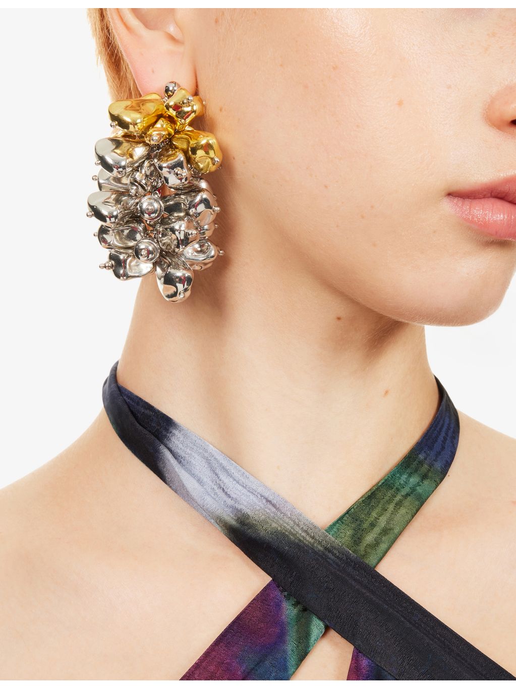 Dries Van Noten brass cluster earrings, imported from the UK