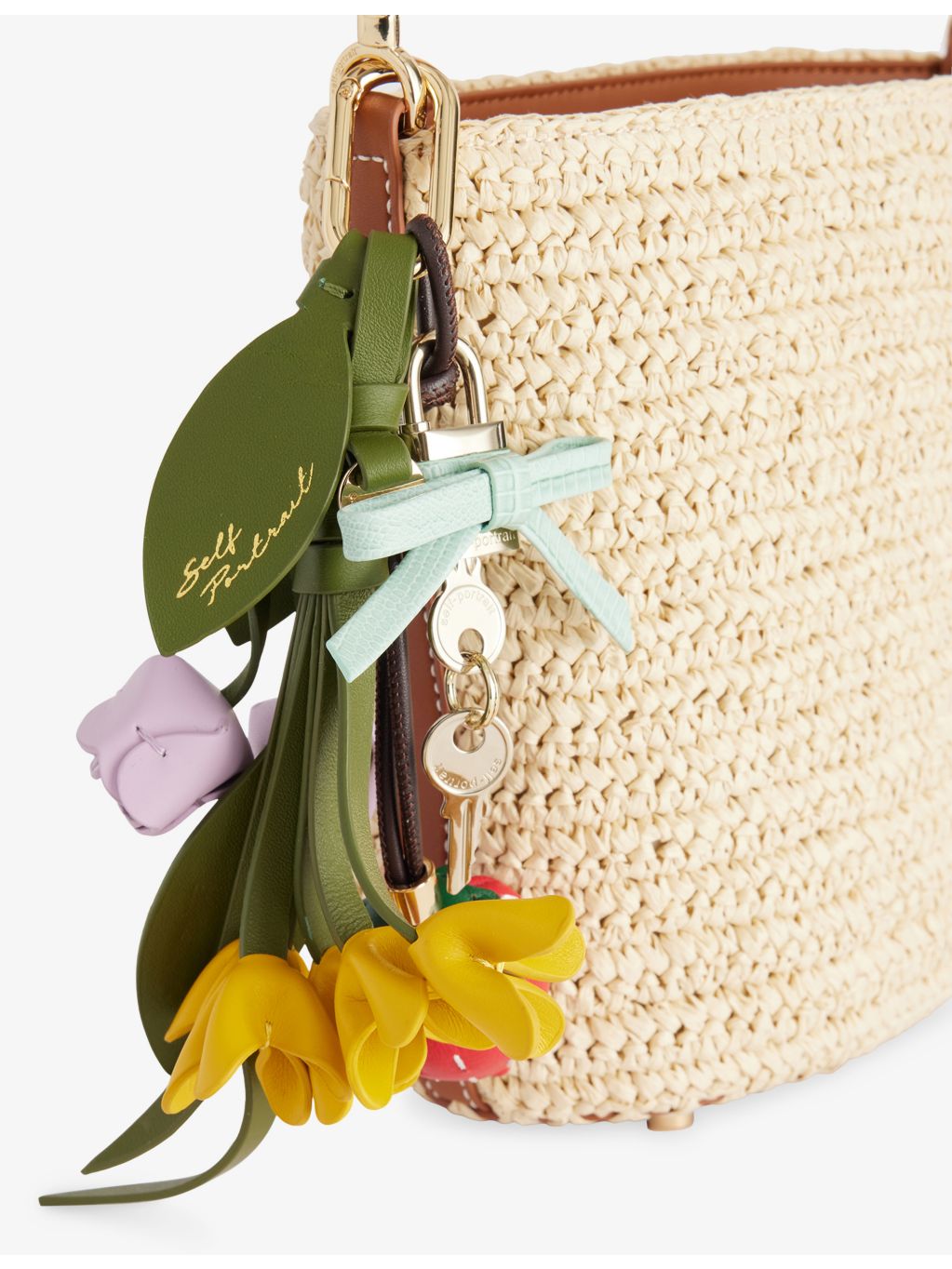 Self-Portrait charm-embellished raffia bucket bag - British product