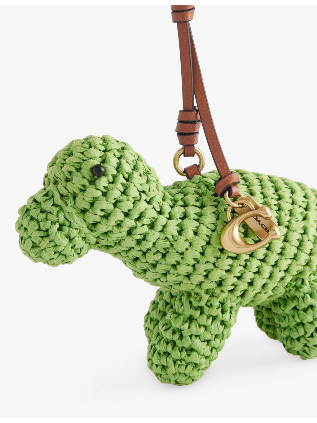Coach raffia dinosaur bag charm with gold-tone hardware, UK version