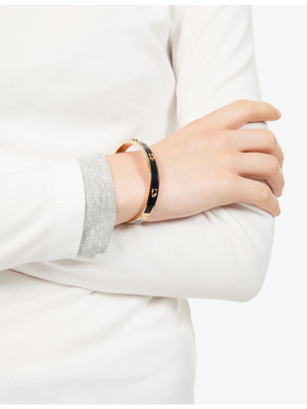 Coach gold-plated brass bangle bracelet with enamel C logo - British product