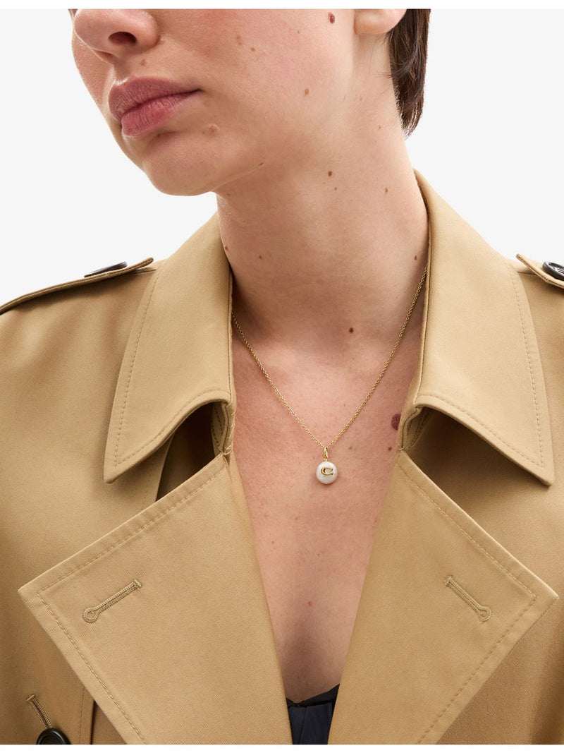 Coach pearl and gold-plated brass pendant necklace, imported from the UK