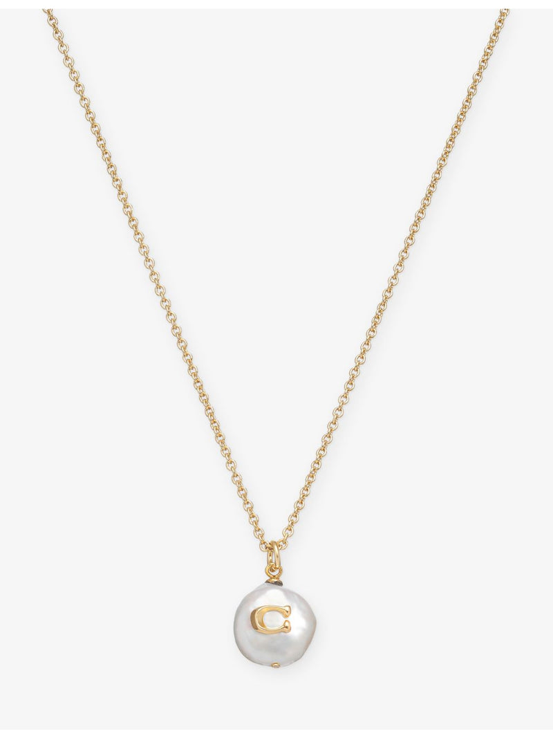 Coach pearl and gold-plated brass pendant necklace, imported from the UK