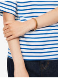 Coach gold-plated enamel bangle with cubic zirconia, UK version