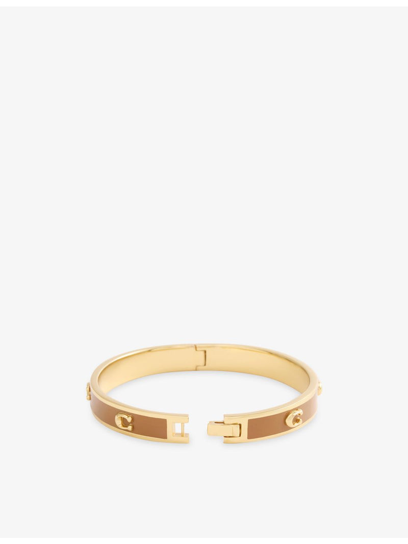 Coach gold-plated enamel bangle with cubic zirconia, UK version