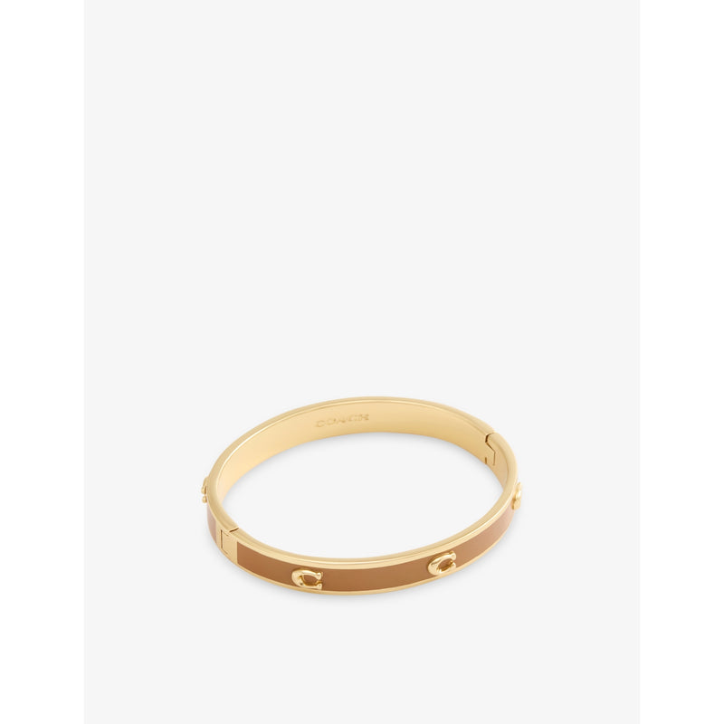 Coach gold-plated enamel bangle with cubic zirconia, UK version