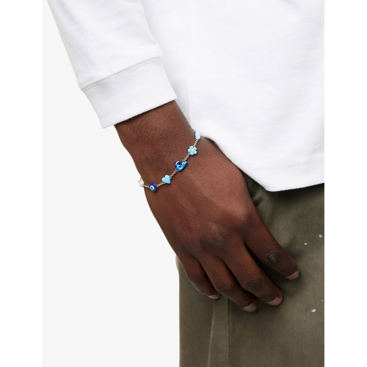 Poubel sterling silver charm bracelet with sea-inspired charms, imported from the UK