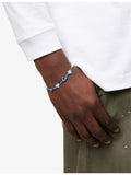 Poubel sterling silver charm bracelet with sea-inspired charms, imported from the UK