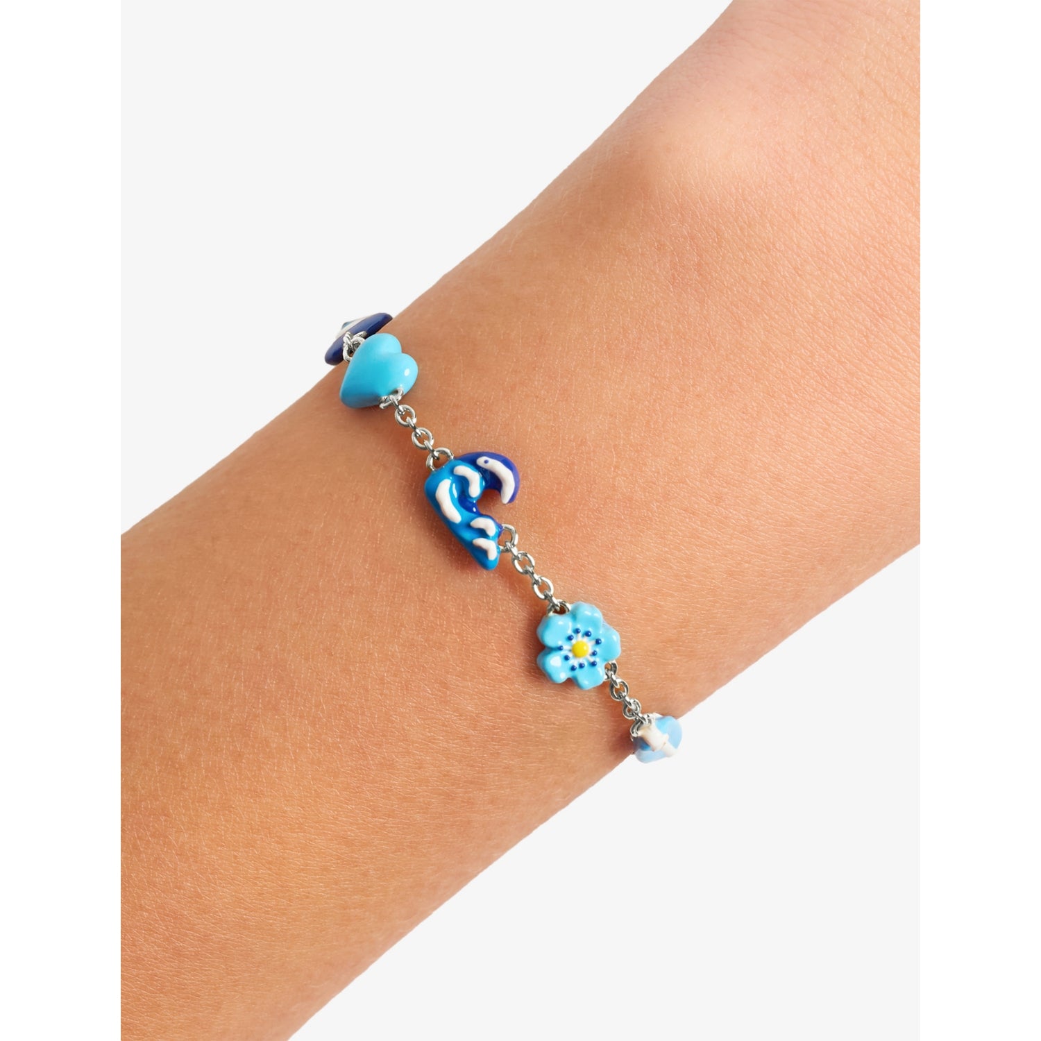 Poubel sterling silver charm bracelet with sea-inspired charms, imported from the UK