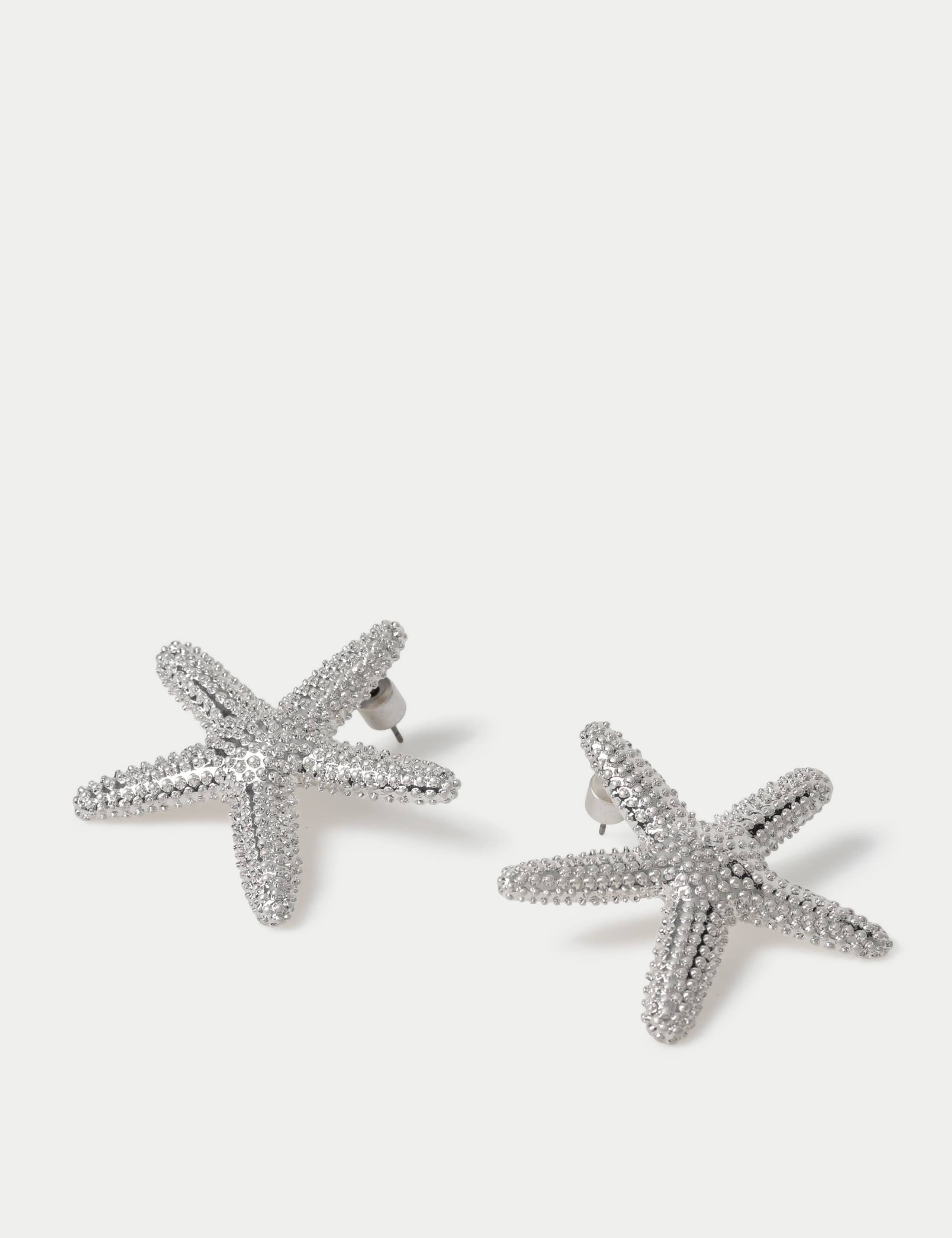 Rhodium oversized starfish stud earrings, imported from the UK