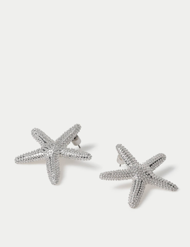 Rhodium oversized starfish stud earrings, imported from the UK