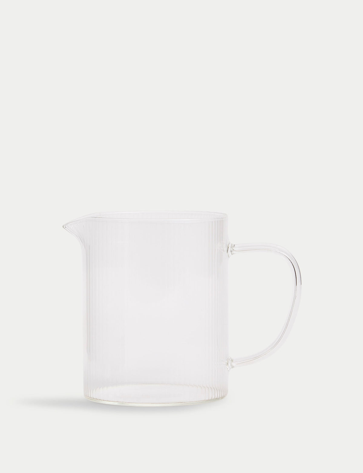 Ribbed glass milk jug, imported from the UK