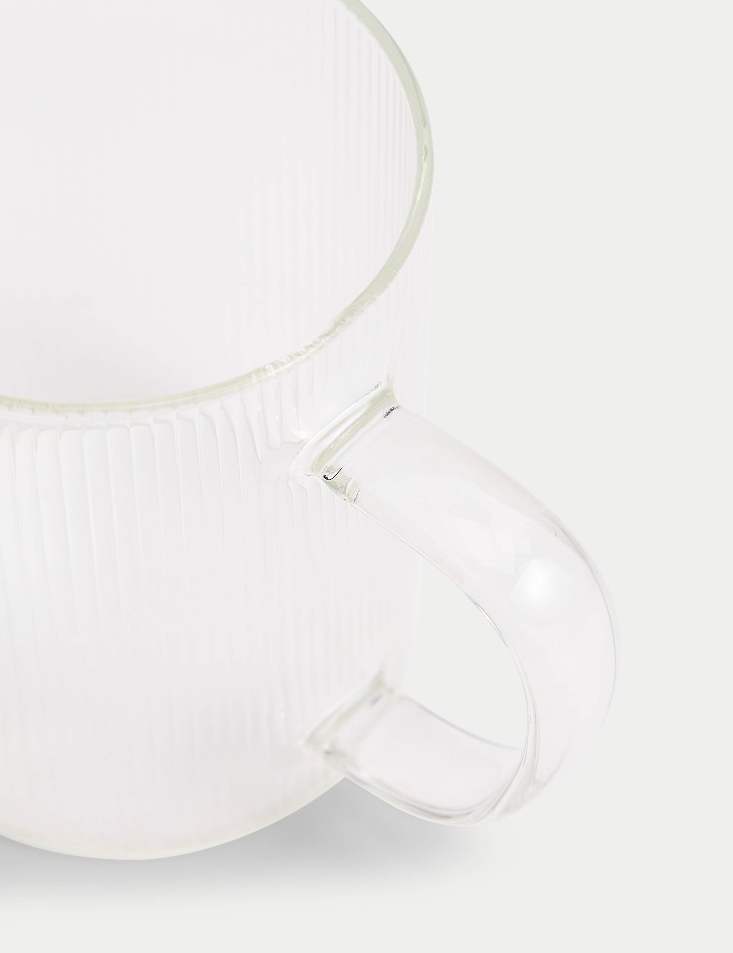 Ribbed glass milk jug, imported from the UK