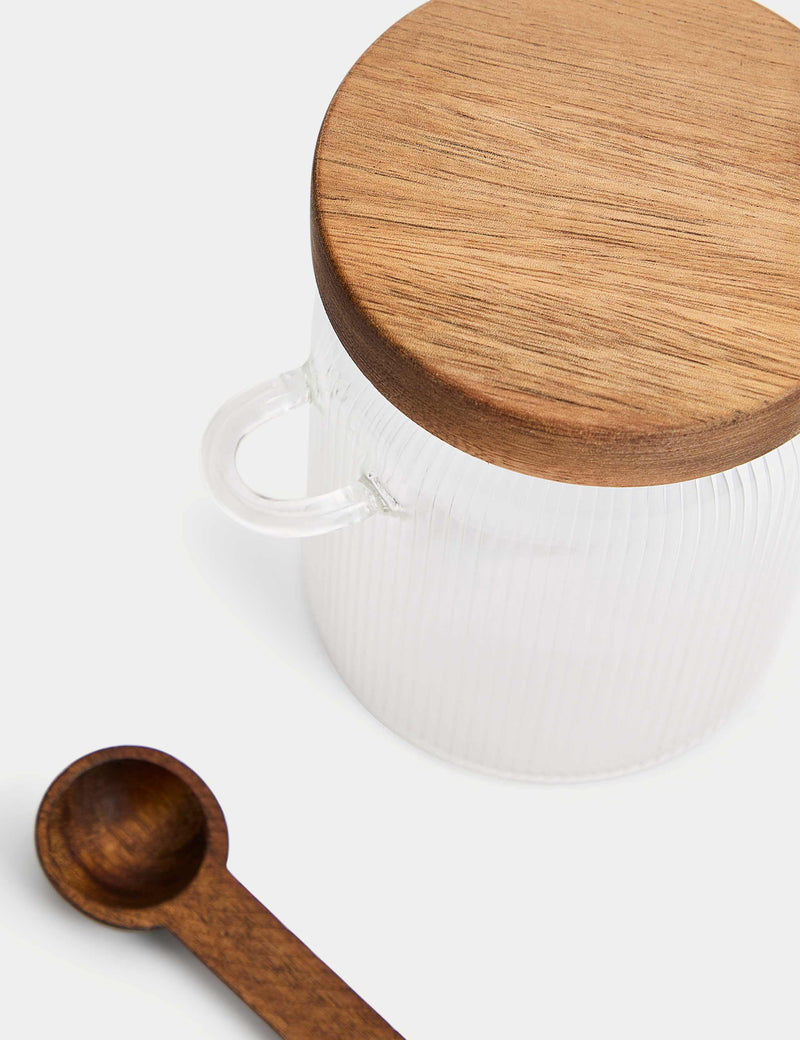 Ribbed glass sugar pot with wooden lid and teaspoon, imported from the UK