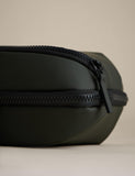 Rubberised travel tech organiser with compartments and secure zip fastenings, UK version