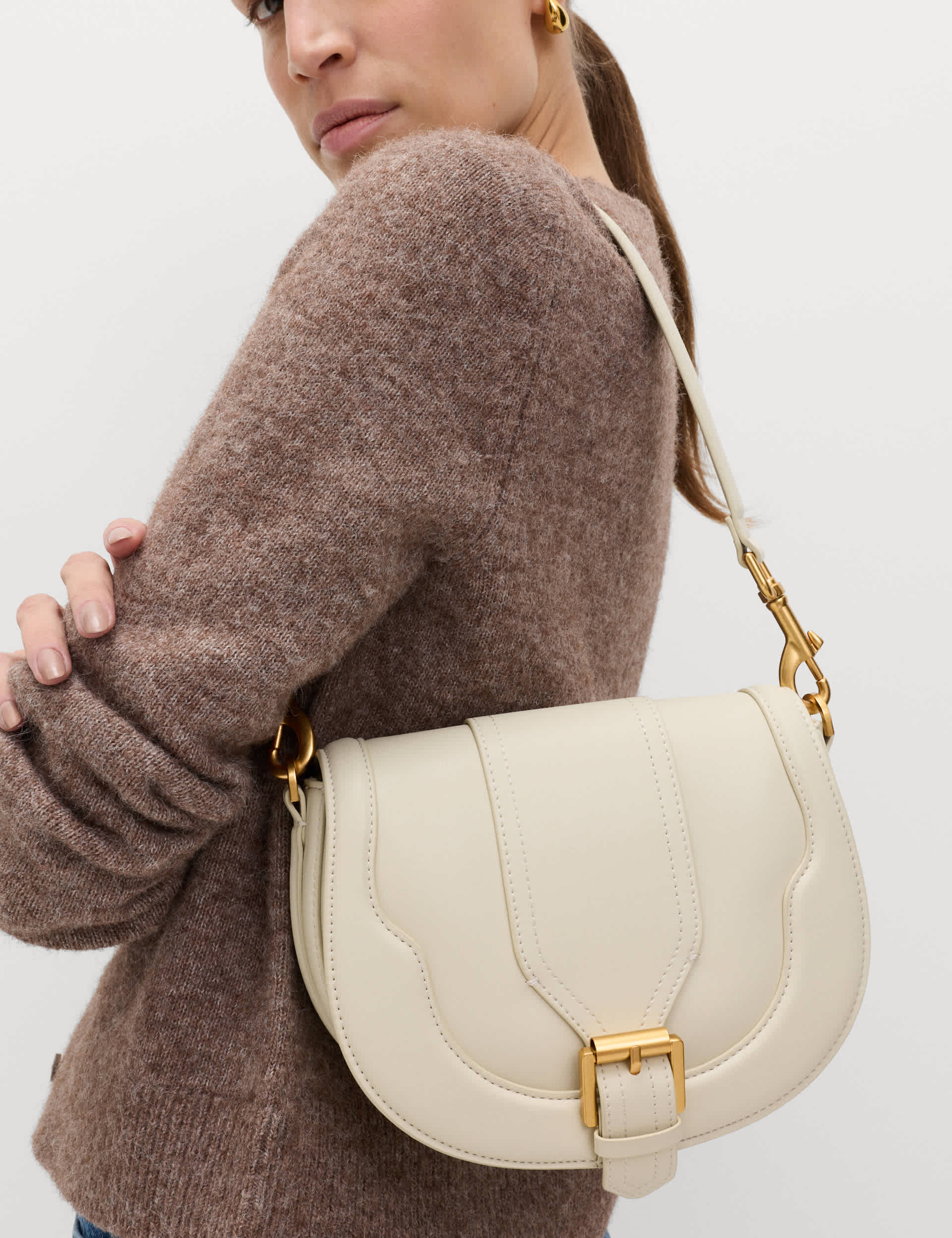 M&S cross body saddle bag with buckle detail, UK version