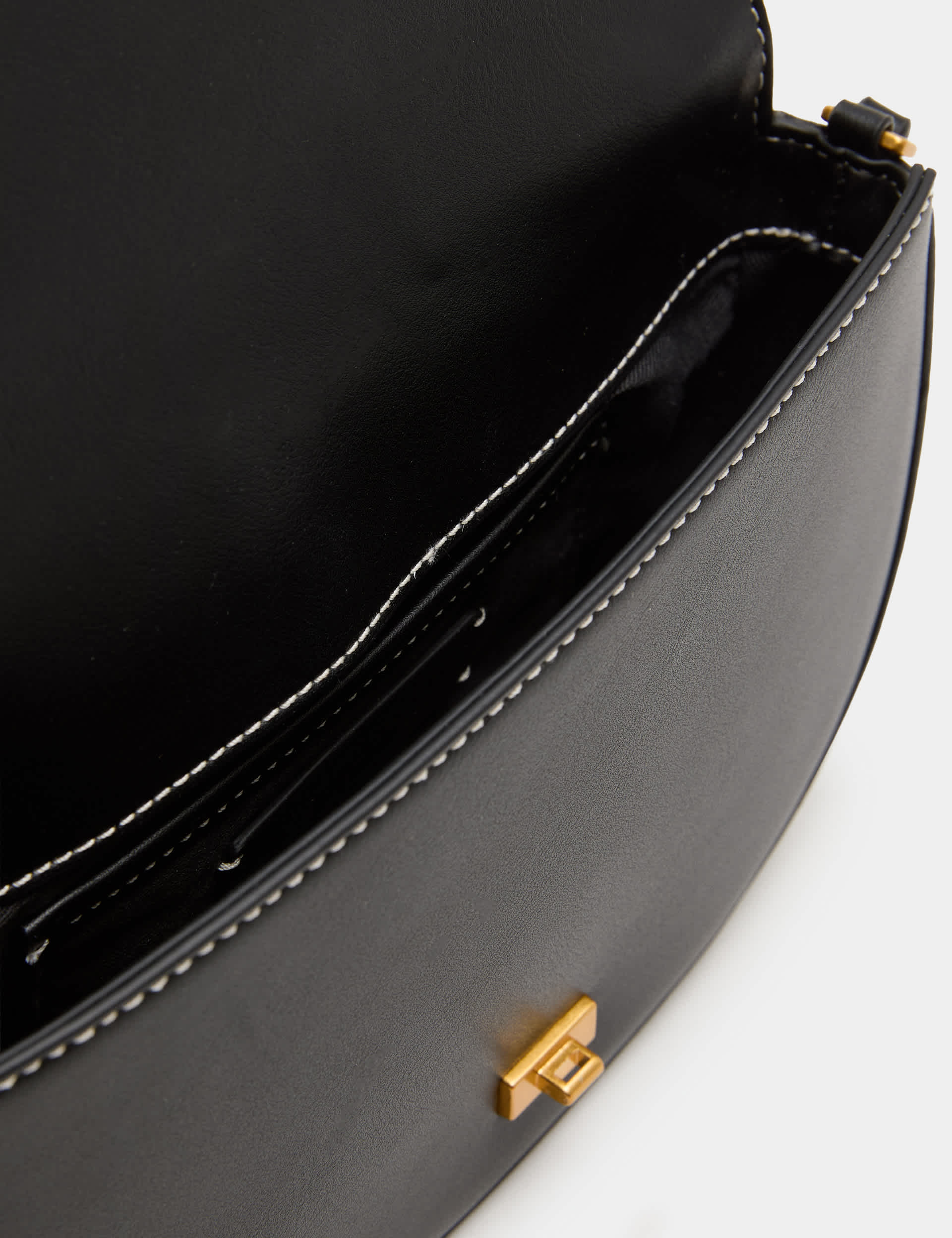 M&S shoulder bag with adjustable strap and compact design (British brand)