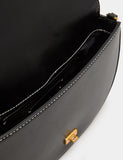 M&S shoulder bag with adjustable strap and compact design (British brand)