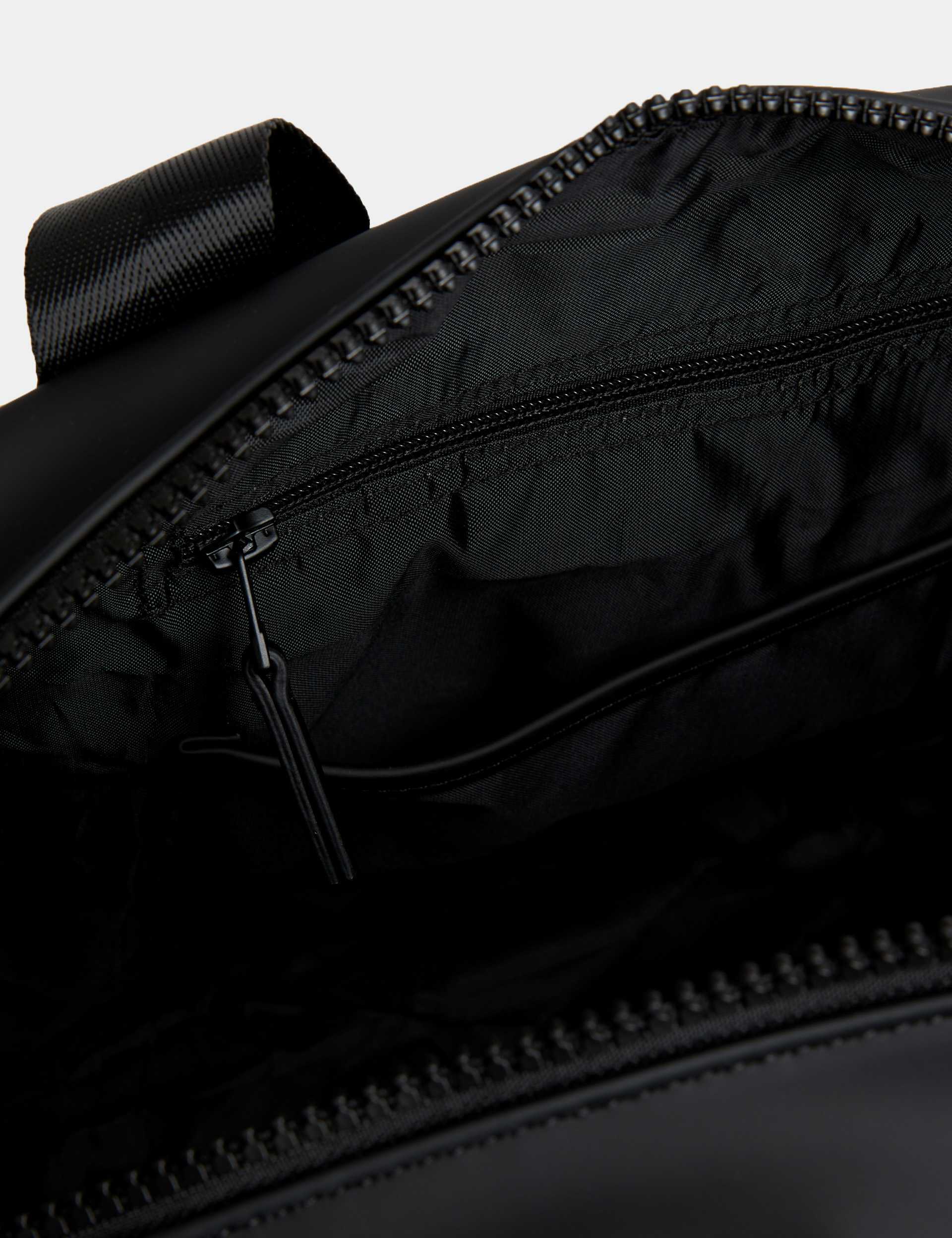 M&S rubberised weekend bag, imported from the UK