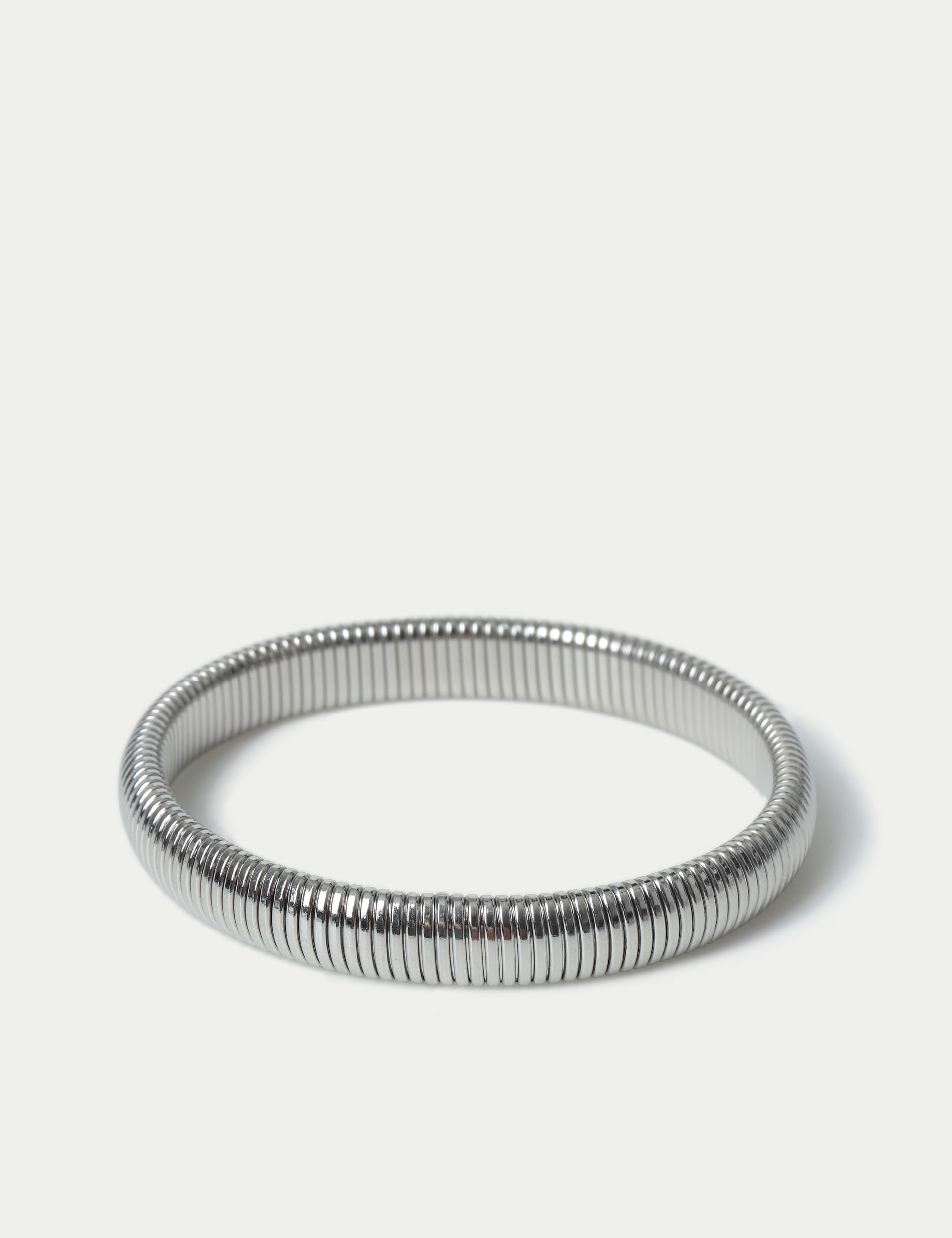 M&S silver tone stainless steel stretch bracelet, imported from the UK