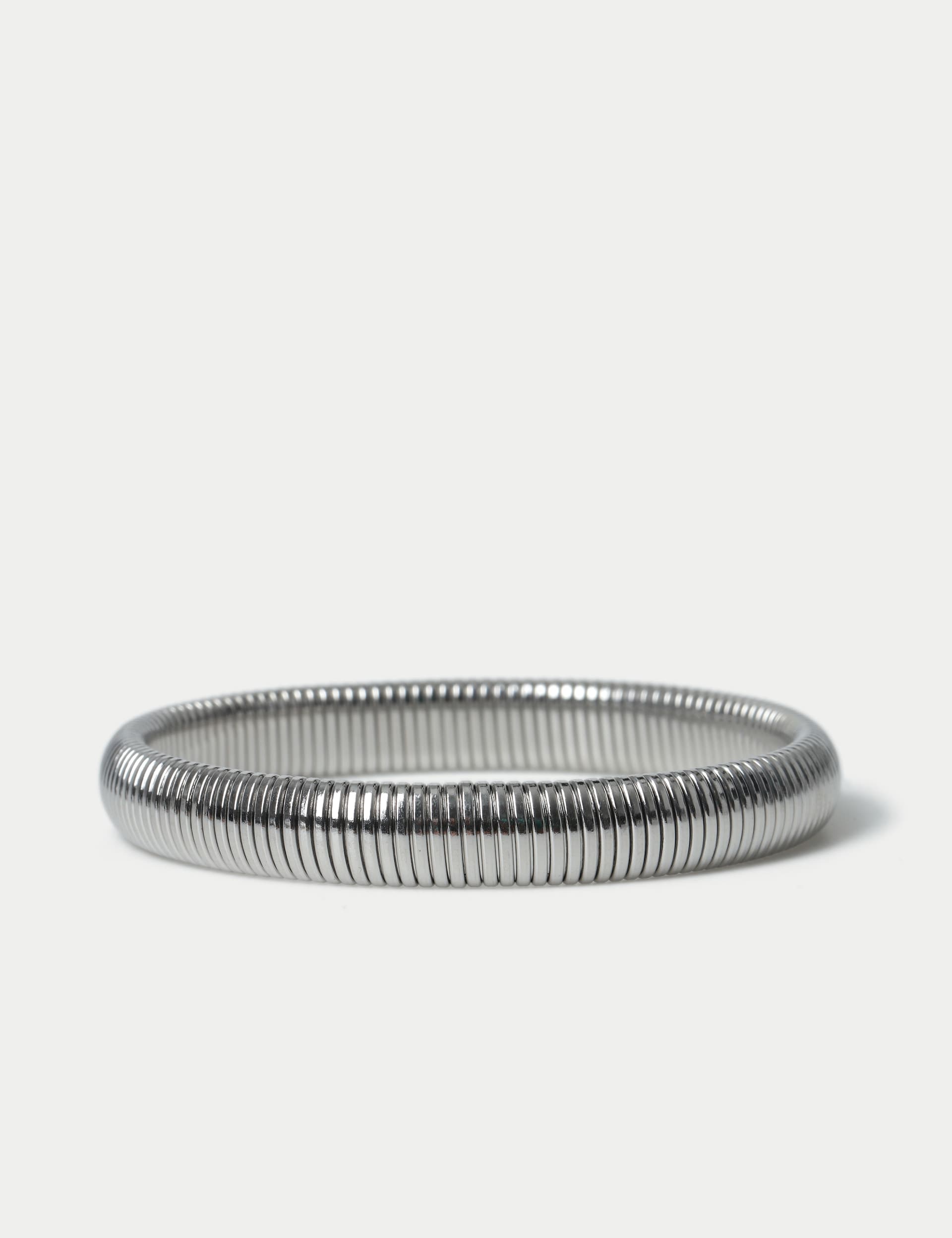 M&S silver tone stainless steel stretch bracelet, imported from the UK