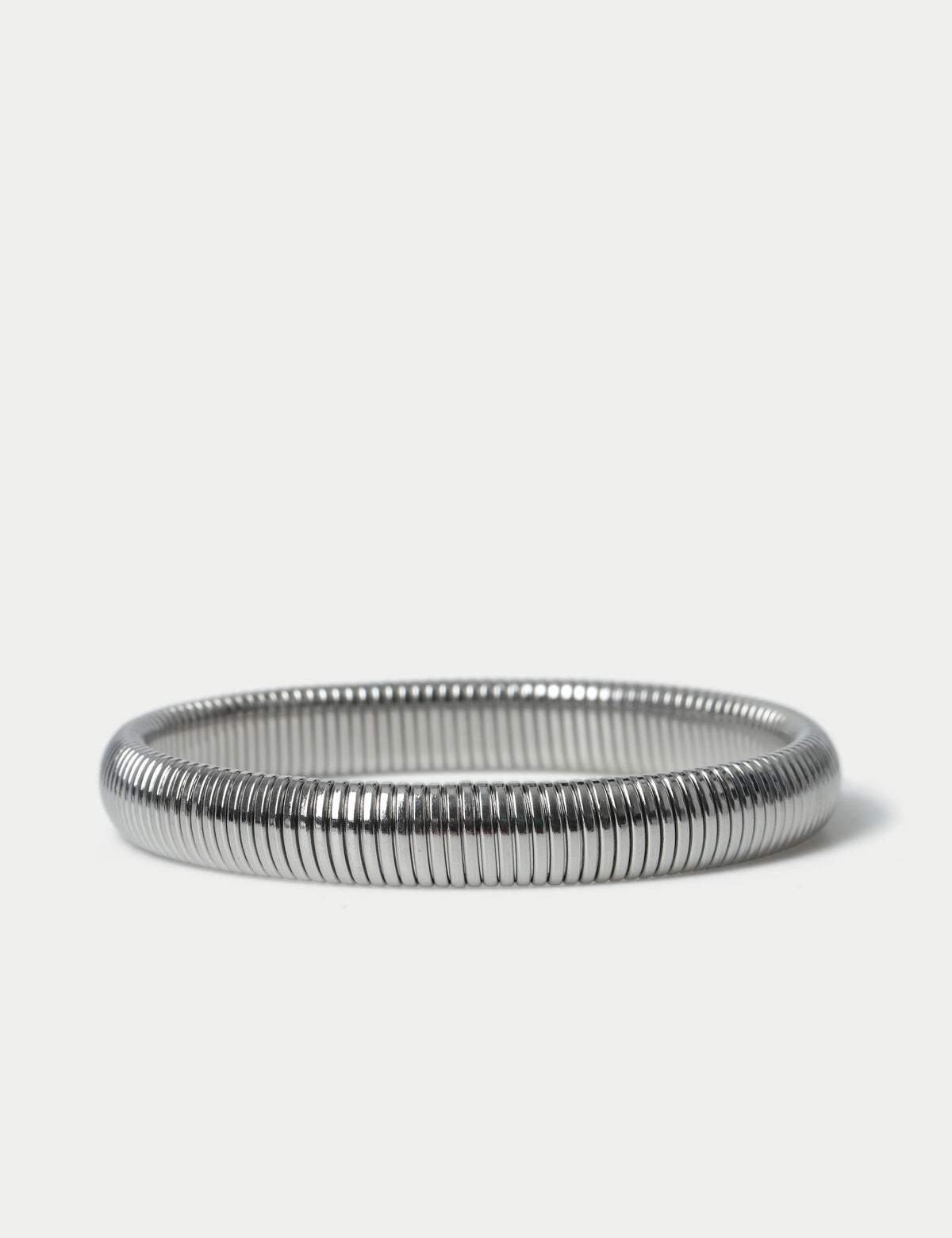M&S silver tone stainless steel stretch bracelet, imported from the UK
