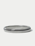 M&S silver tone stainless steel stretch bracelet, imported from the UK