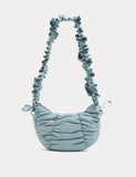 Textured crossbody bag with ruched strap and bows - British product