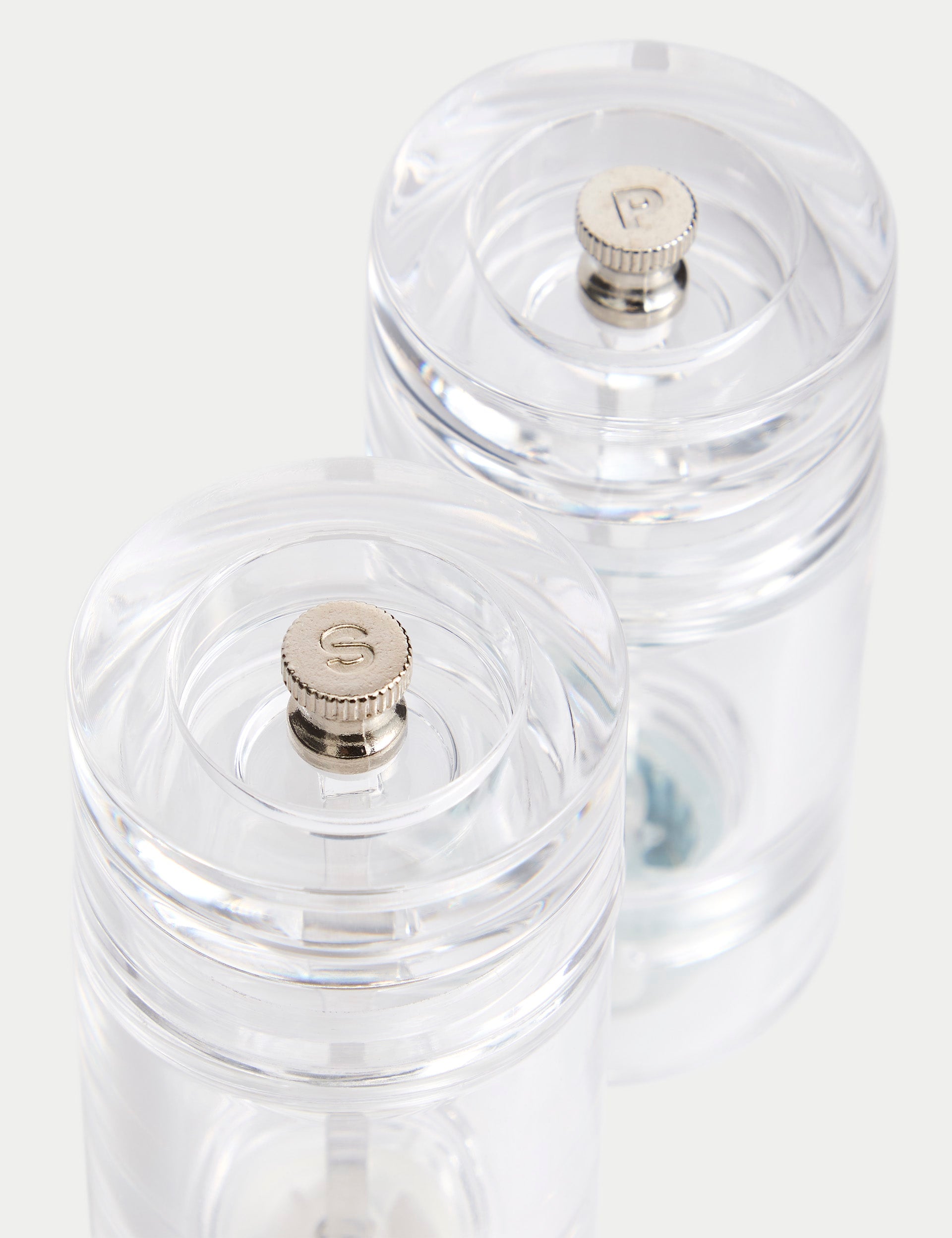 Clear plastic salt and pepper mills (British brand)