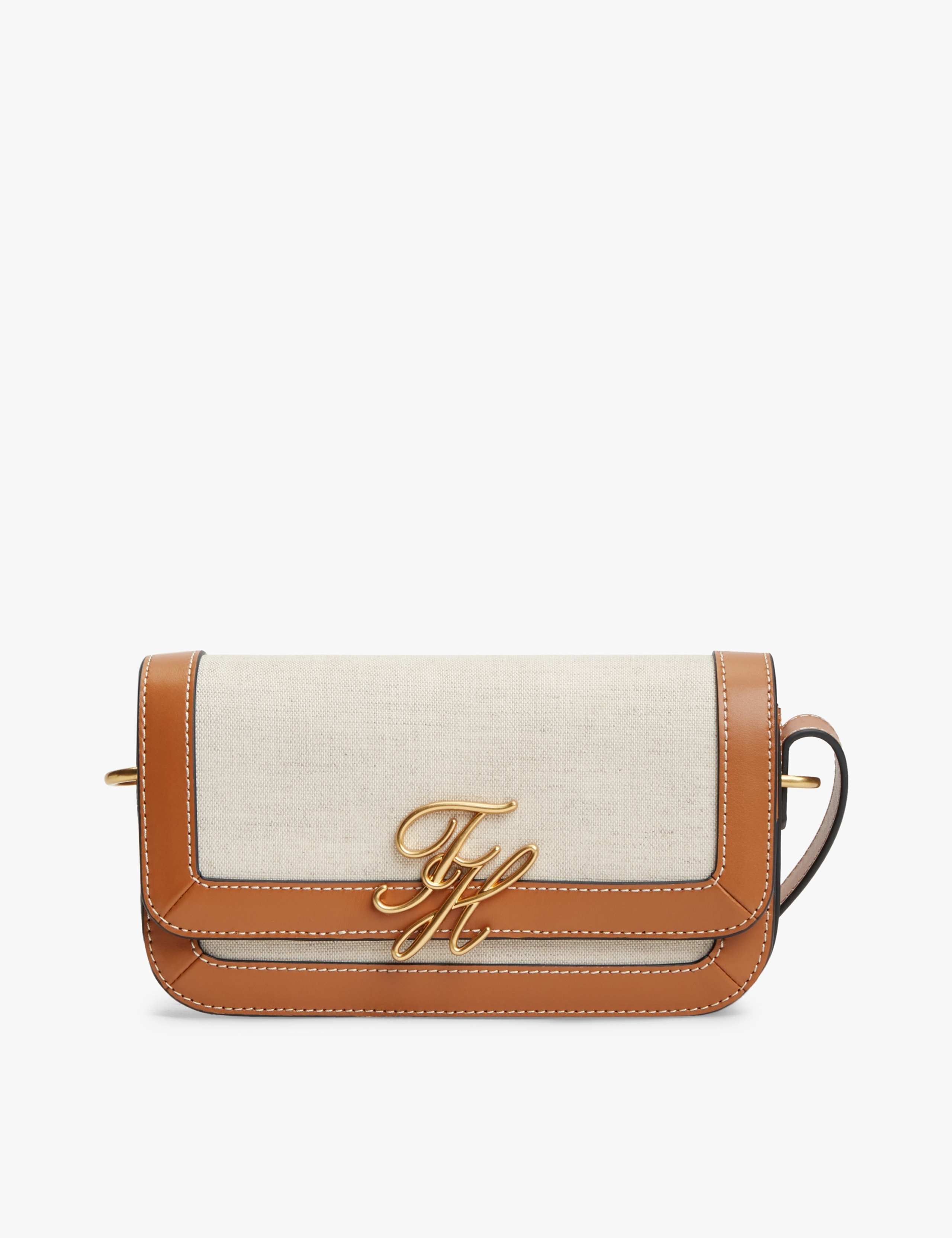 Tommy Hilfiger Script Canvas cross body bag with leather trim, UK version