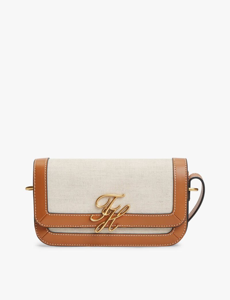 Tommy Hilfiger Script Canvas cross body bag with leather trim, UK version