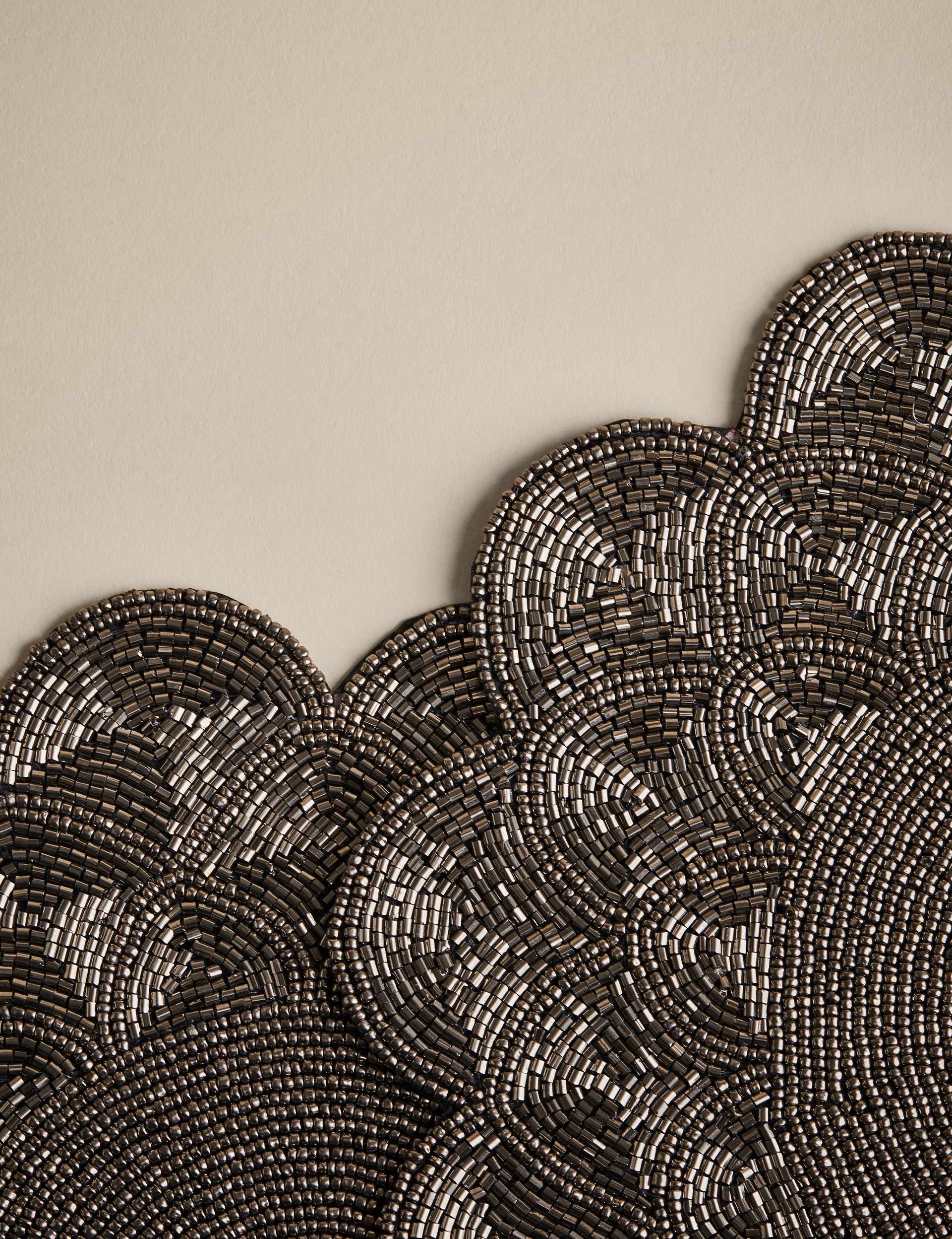 Set of two beaded scallop placemats (British brand)