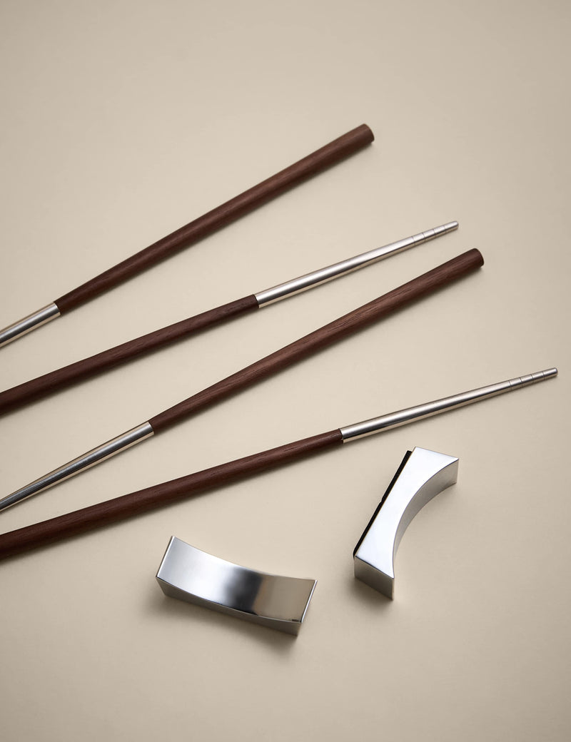Set of two chopsticks with rests in metal and wood, UK version