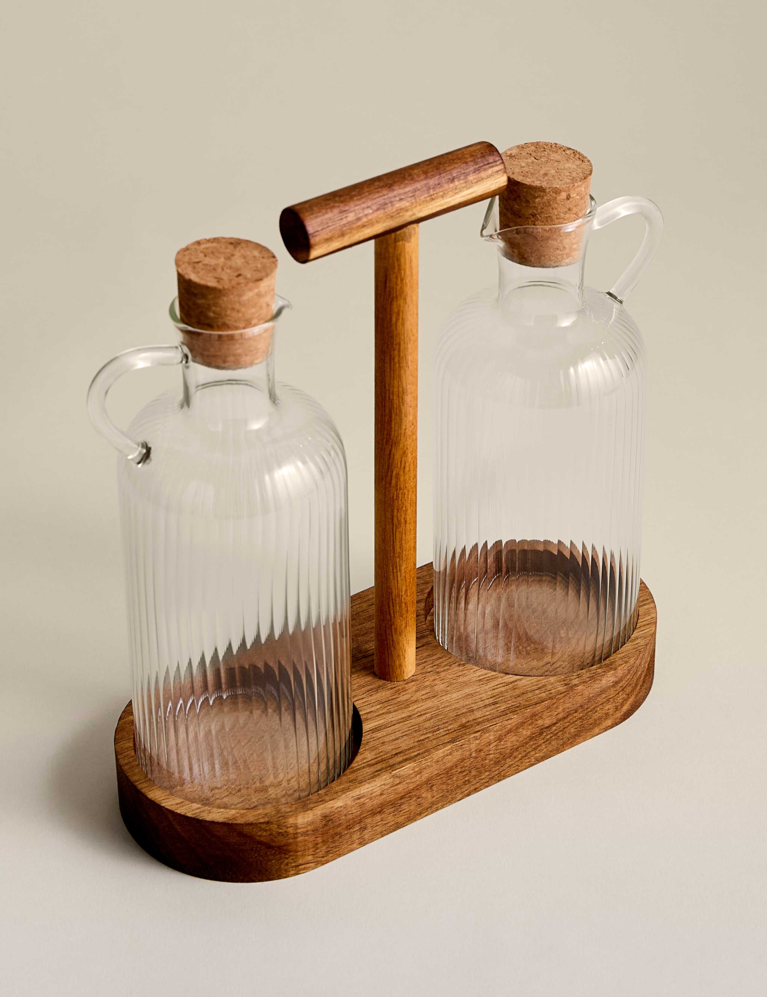 Glass oil pourers set of two with acacia wood caddy (British brand)