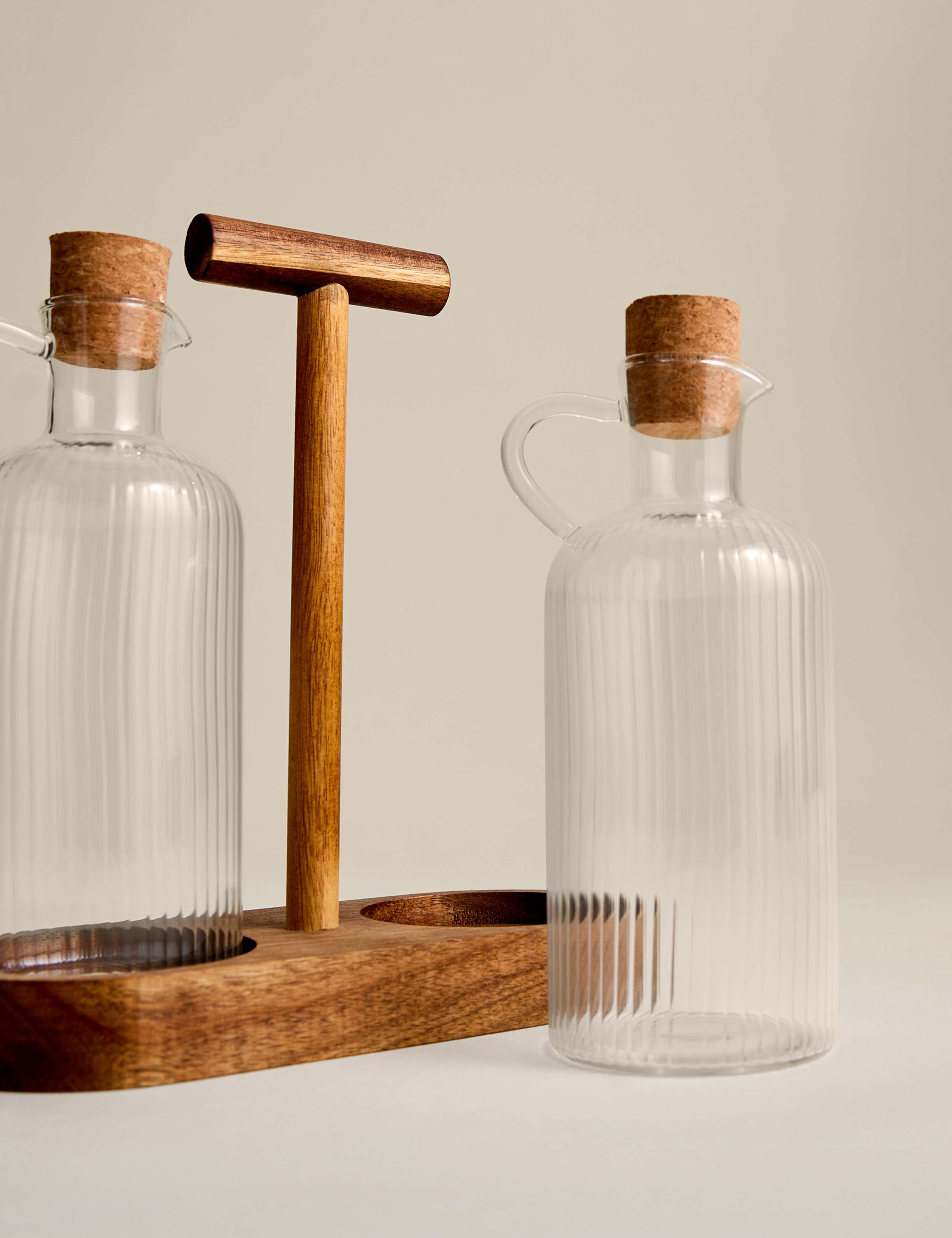 Glass oil pourers set of two with acacia wood caddy (British brand)