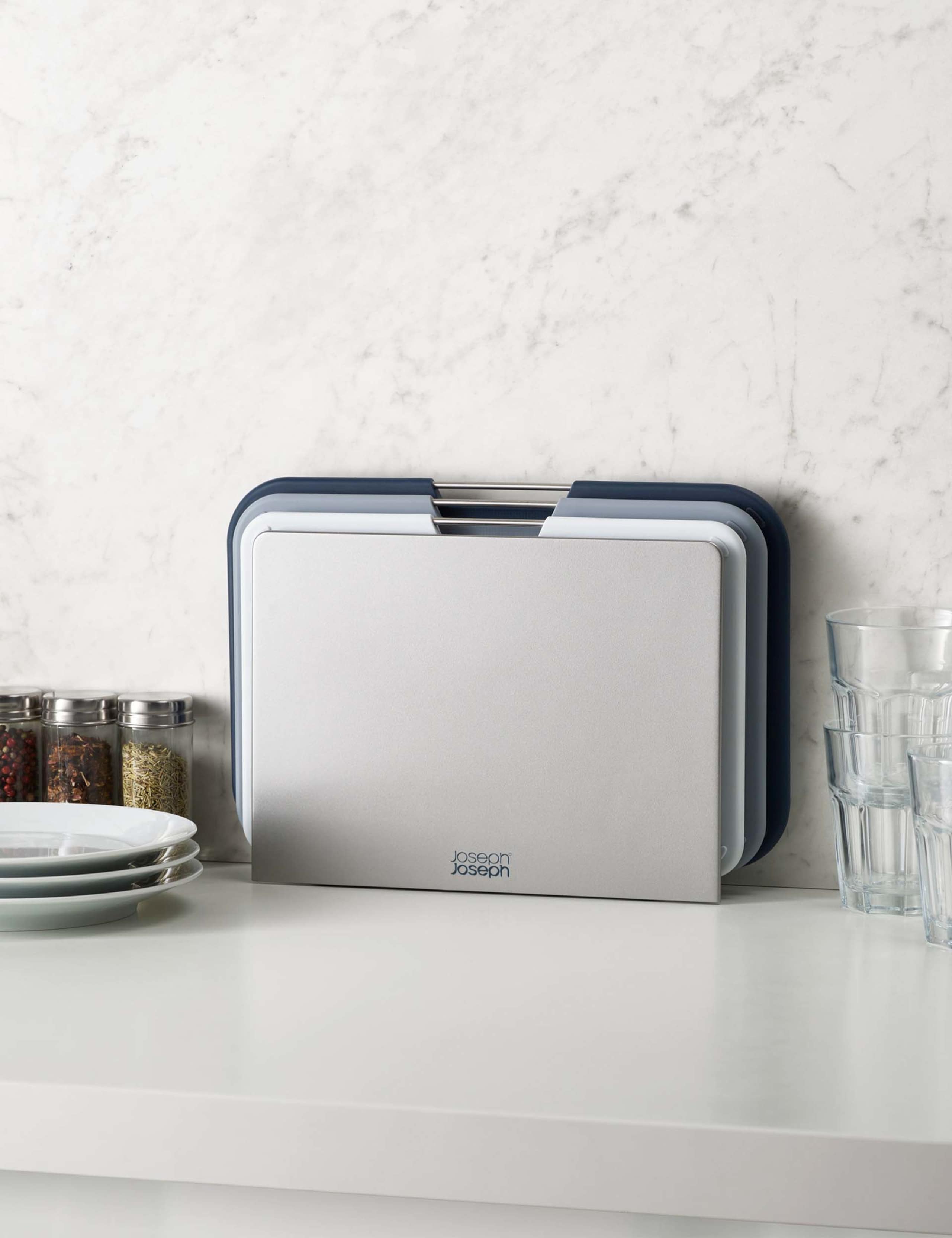 Joseph Joseph set of 3 plastic chopping boards with storage stand (British brand)