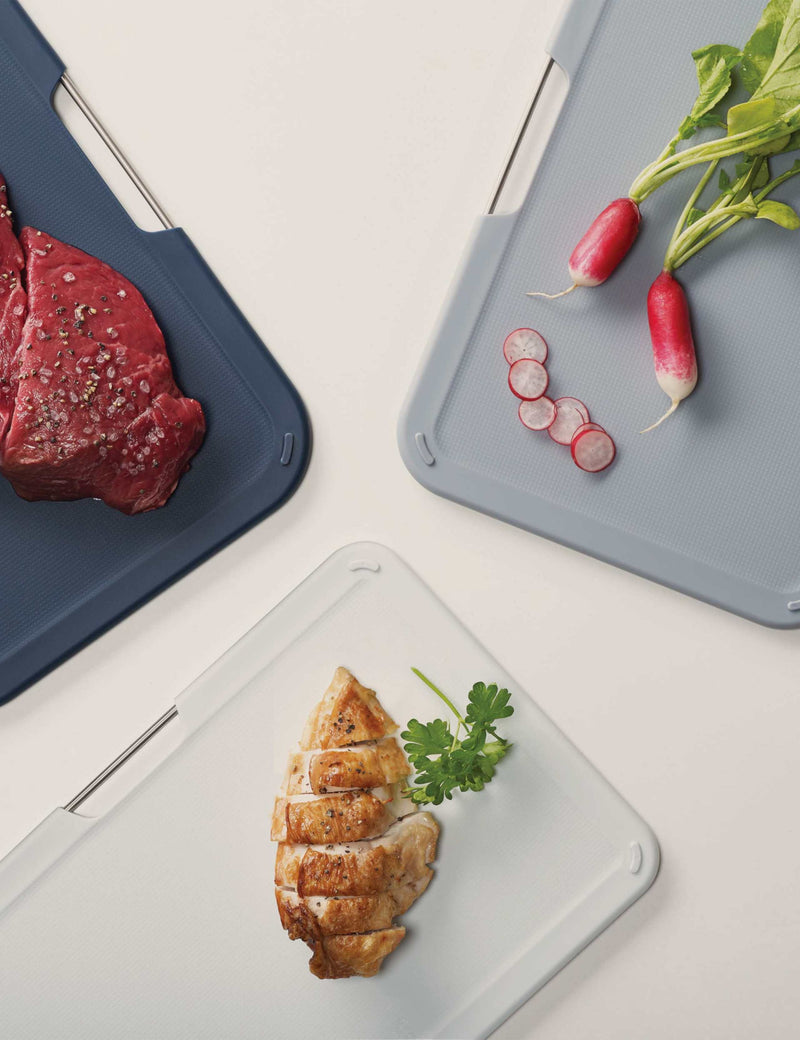 Joseph Joseph set of 3 plastic chopping boards with storage stand (British brand)
