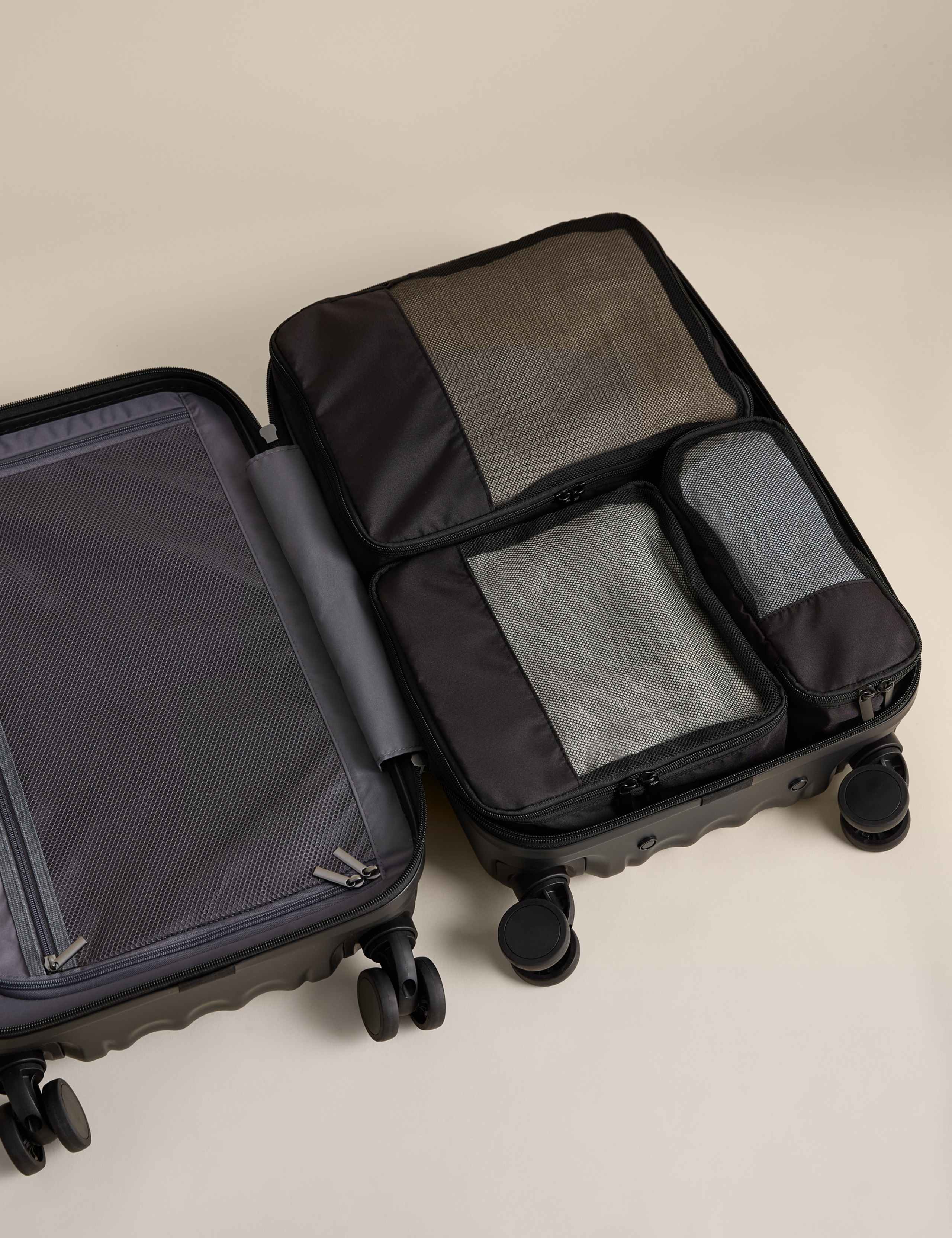 Packing cubes set with mesh tops in three sizes - British product