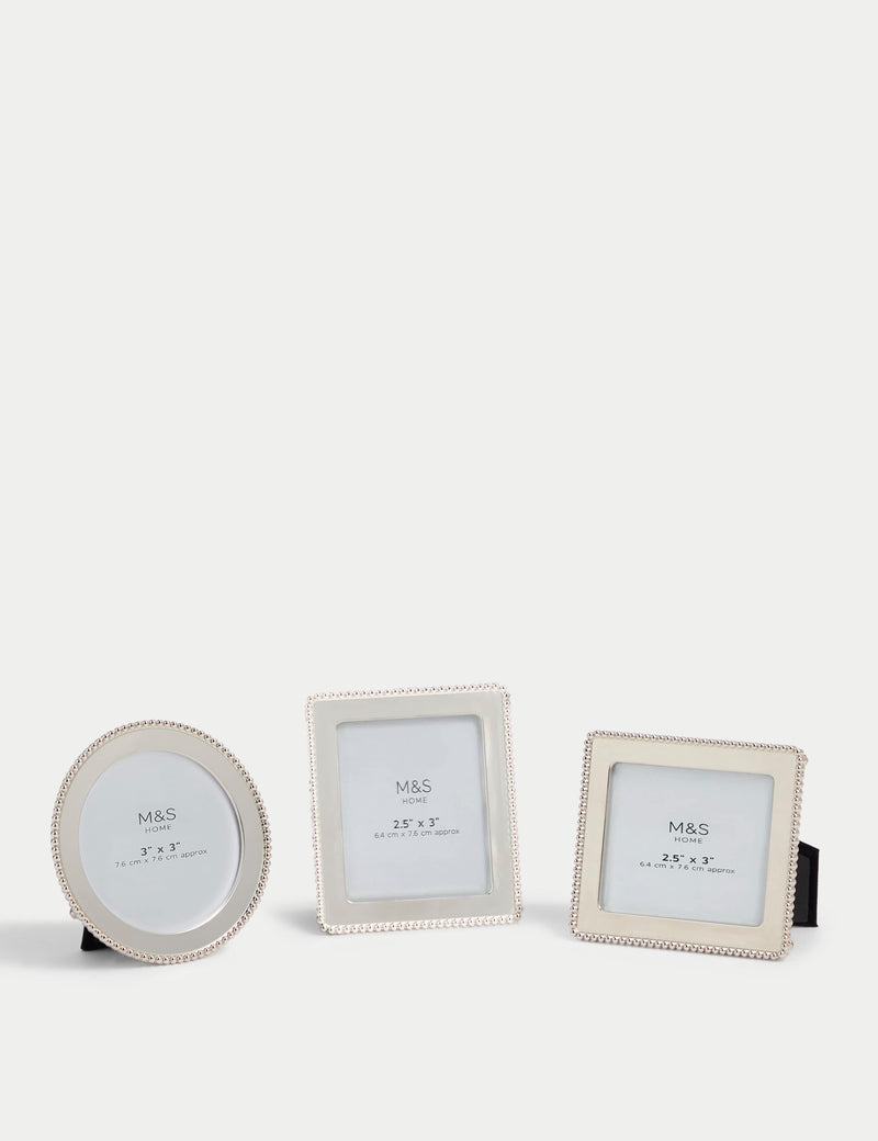 Set of three silver photo frames with square, rectangular, and circular shapes (British brand)