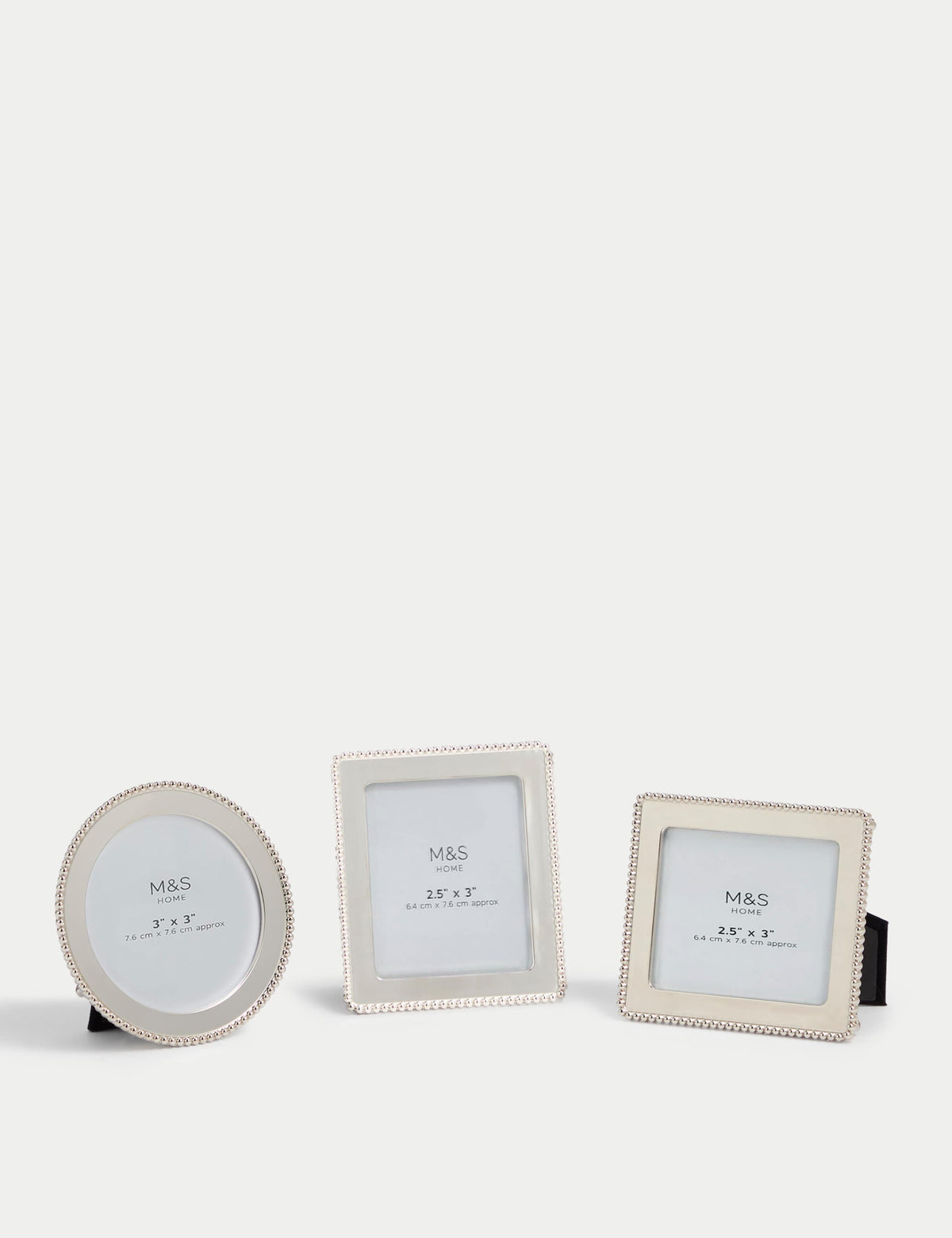 Set of three silver photo frames with square, rectangular, and circular shapes (British brand)