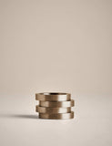 Set of four metallic napkin rings (British brand)