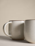 Set of four speckled ceramic mugs with contrast rims - British product