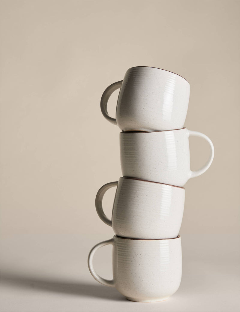 Set of four speckled ceramic mugs with contrast rims - British product
