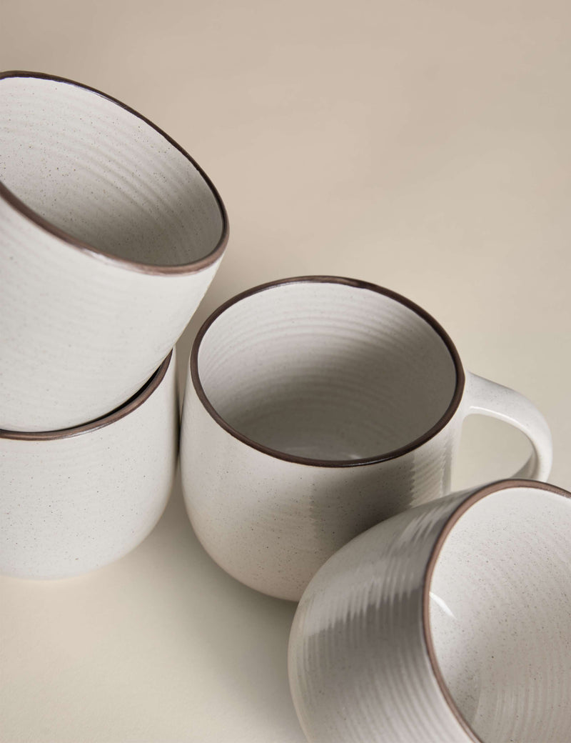 Set of four speckled ceramic mugs with contrast rims - British product
