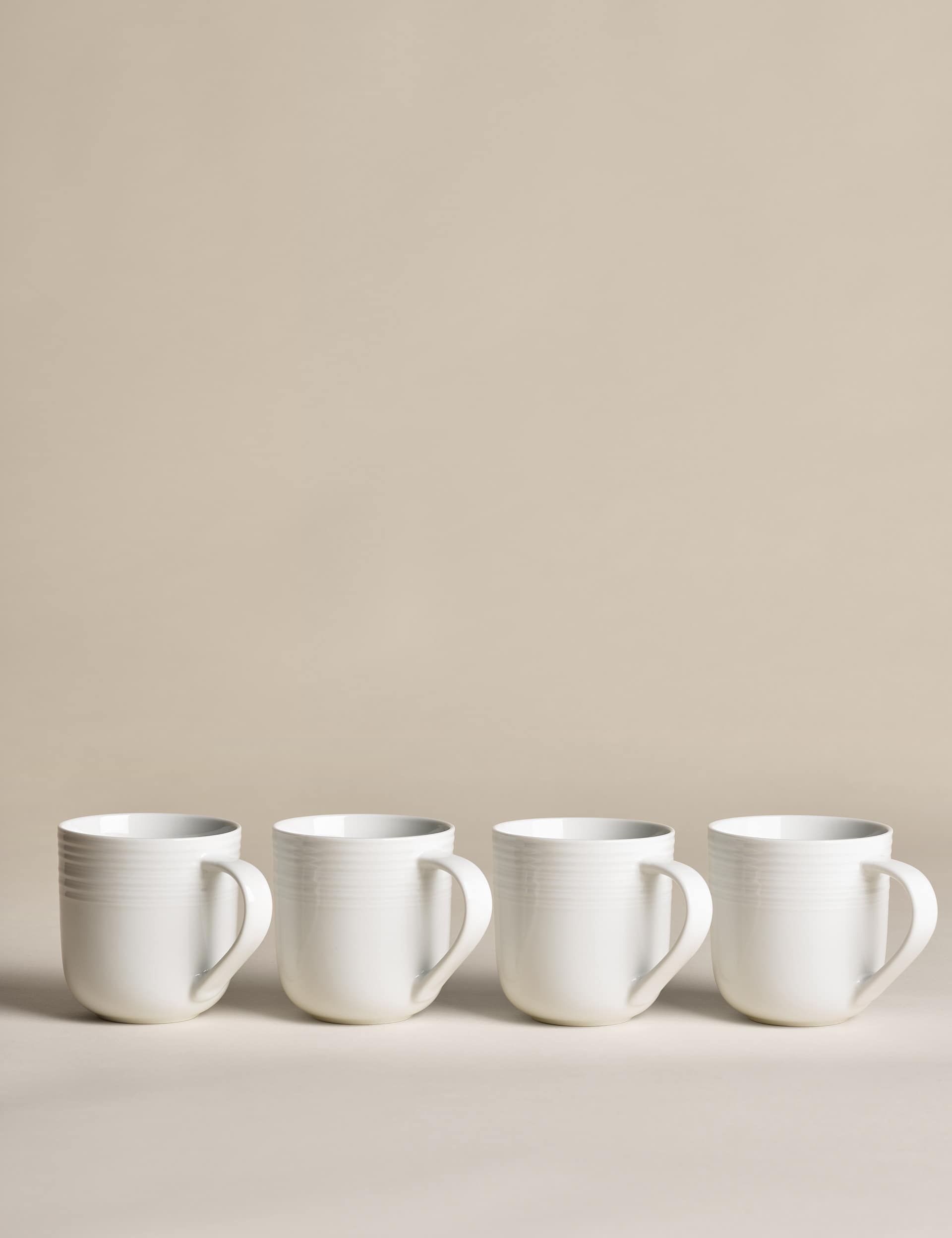 Set of four ribbed porcelain mugs (British brand)