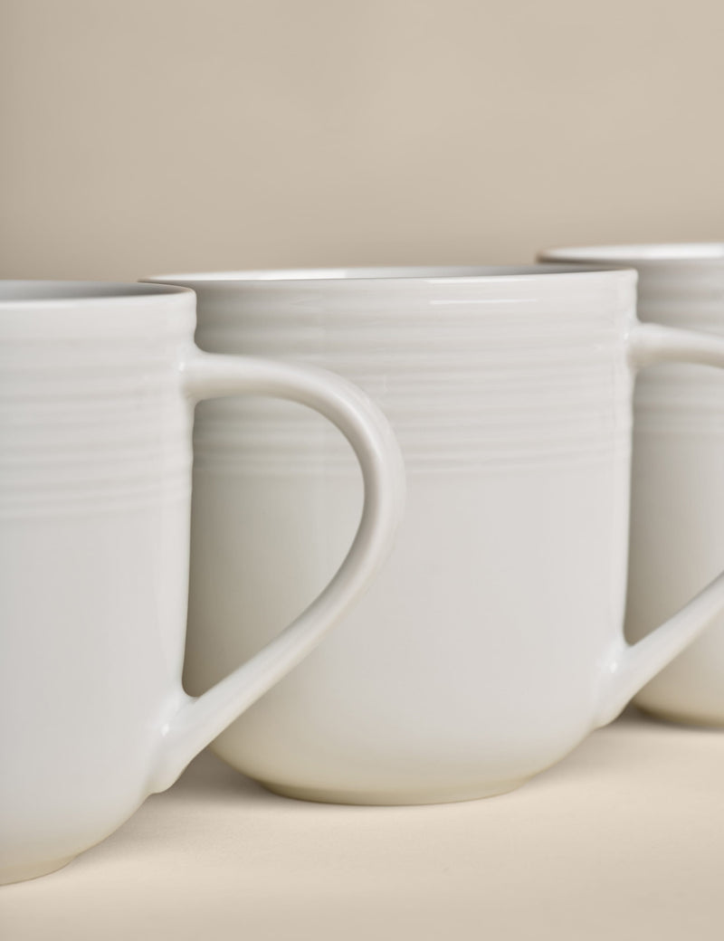 Set of four ribbed porcelain mugs (British brand)