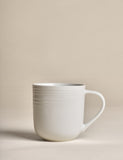 Set of four ribbed porcelain mugs (British brand)
