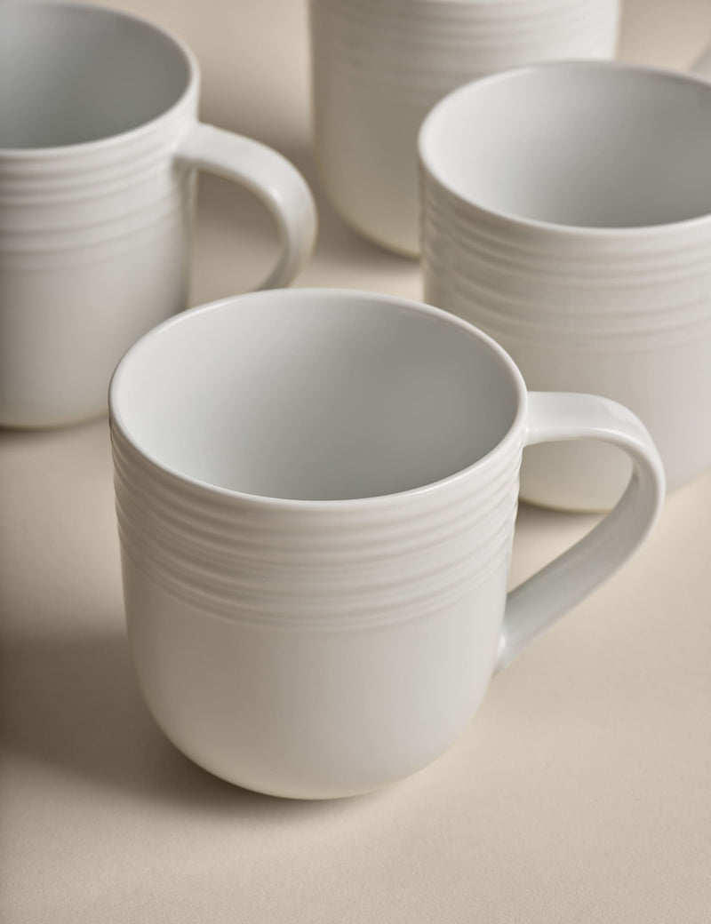 Set of four ribbed porcelain mugs (British brand)